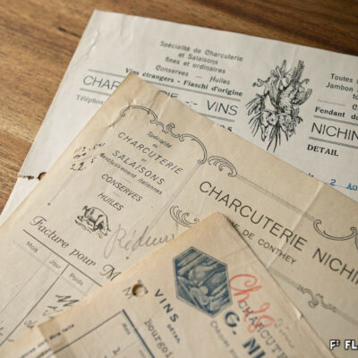 En-têtes de factures de la charcuterie Nichini Guido, rue de Conthey puis rue du Rhône, 1922, 1939, 1943 © Pentamedia, Archives de la Ville de Sion, 2020