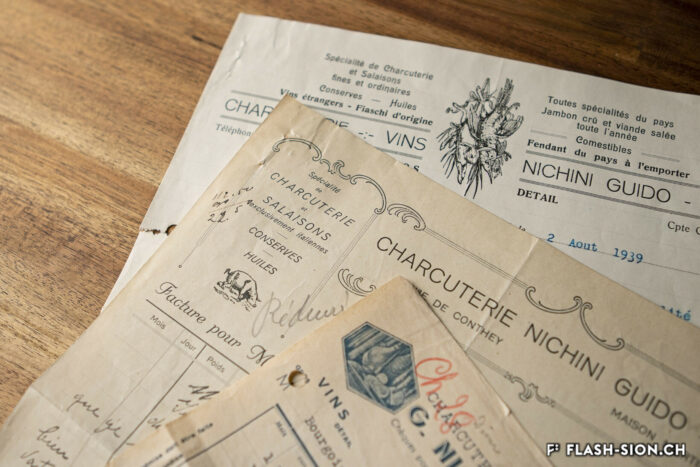 En-têtes de factures de la charcuterie Nichini Guido, rue de Conthey puis rue du Rhône, 1922, 1939, 1943 © Pentamedia, Archives de la Ville de Sion, 2020