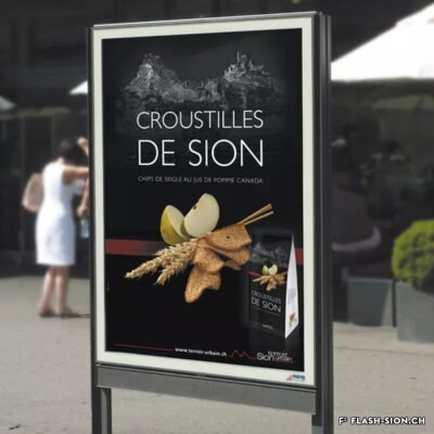 En 2011, les croustilles de Sion de la maison Zenhäusern sortent lauréates du concours lancé par Sion-terroir urbain et deviennent les ambassadrices de la ville gourmande, affiche 2011 © Eddy Pelfini